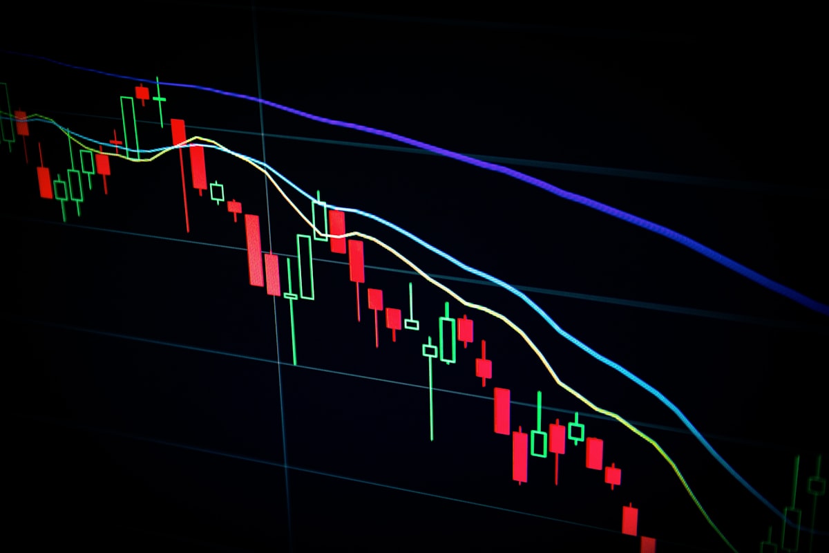 Generic stock photo of a financial market chart on a trading screen with volatile price movement, symbolizing AI-sector capital flows — not a chart of actual AI capex data