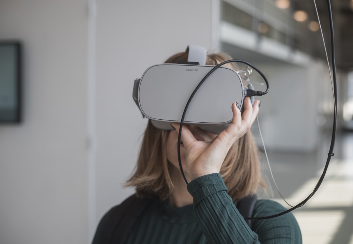 Generic stock photo of a person wearing a white VR headset — illustrative imagery only, not a screenshot or photograph related to the synchronized AI outage