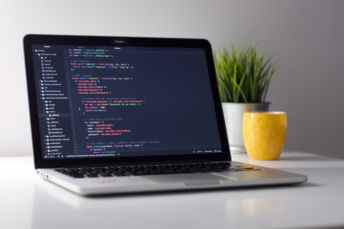 A developer workstation with code on screen — the daily environment where editor performance and workflow efficiency matter most